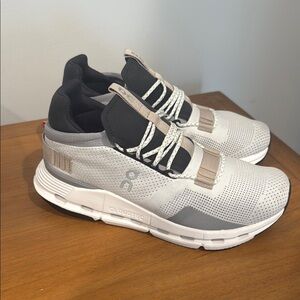 On Cloudnova Women’s Running Sneaker | White Sand and Gray